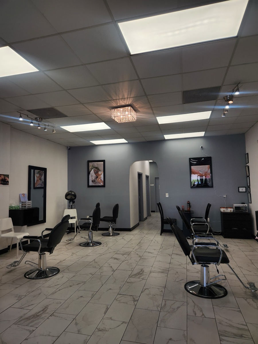 Bright CS Salon interior with styling chairs and chandelier